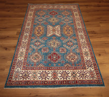 Load image into Gallery viewer, "antique kazak rug" "kazak rug origin" "antique kazak rugs for sale" "kazak rugs" "gabbeh rugs" "oushak rugs"
